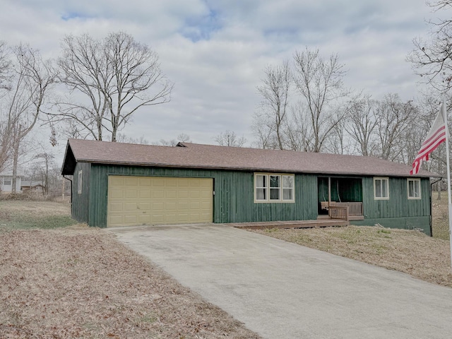 ranch-style home featuring a garage