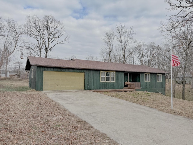 single story home featuring a garage