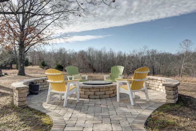 view of patio featuring a fire pit