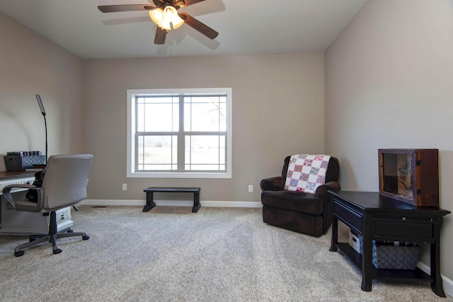 office space featuring light colored carpet and ceiling fan