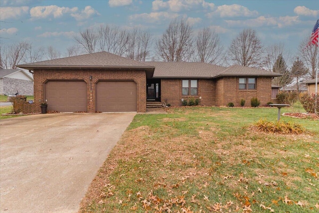 ranch-style home with a front lawn and a garage