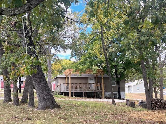 view of yard with a deck