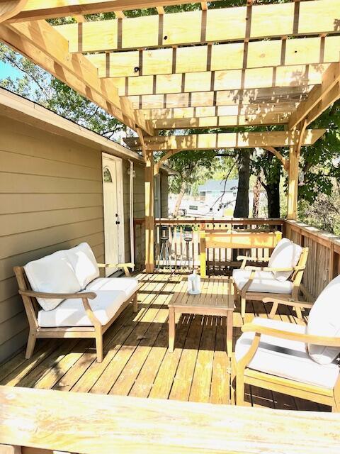 deck featuring a pergola