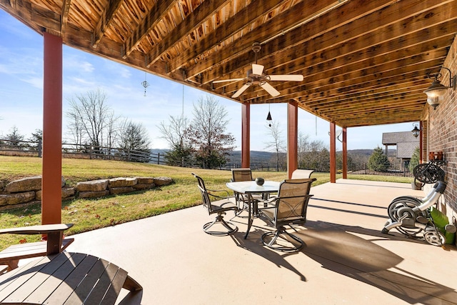 view of patio featuring ceiling fan