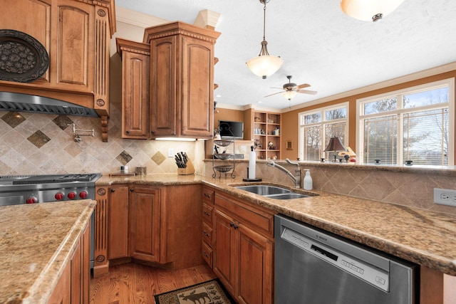 kitchen with dishwasher, decorative backsplash, sink, light hardwood / wood-style flooring, and crown molding