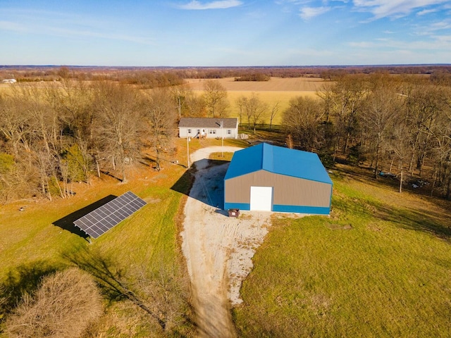 birds eye view of property featuring a rural view