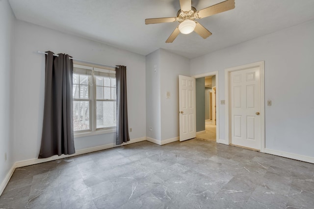 spare room with ceiling fan