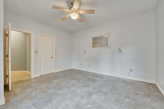 unfurnished room with ceiling fan