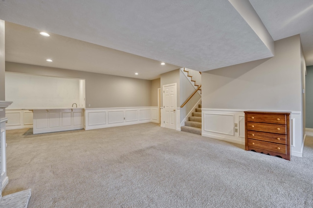 basement with light carpet