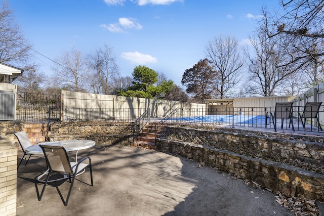 view of patio with a covered pool