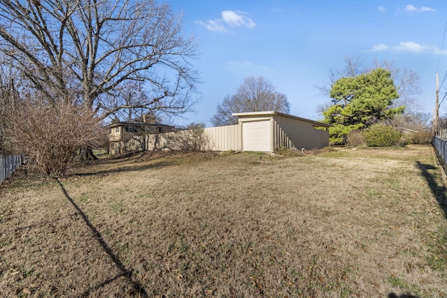 view of yard featuring a garage