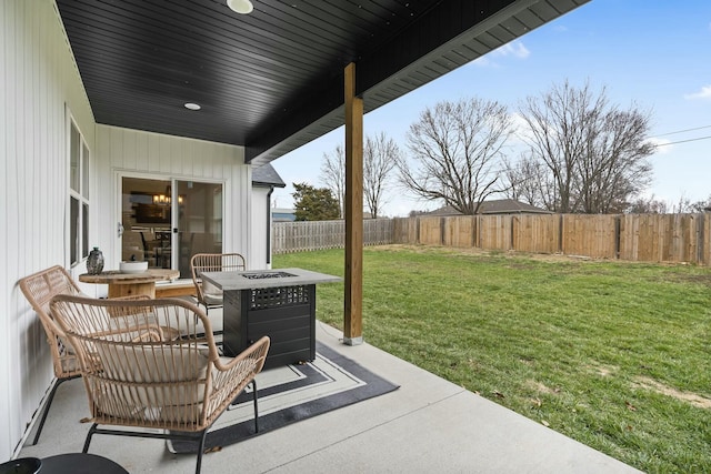 view of patio with an outdoor fire pit