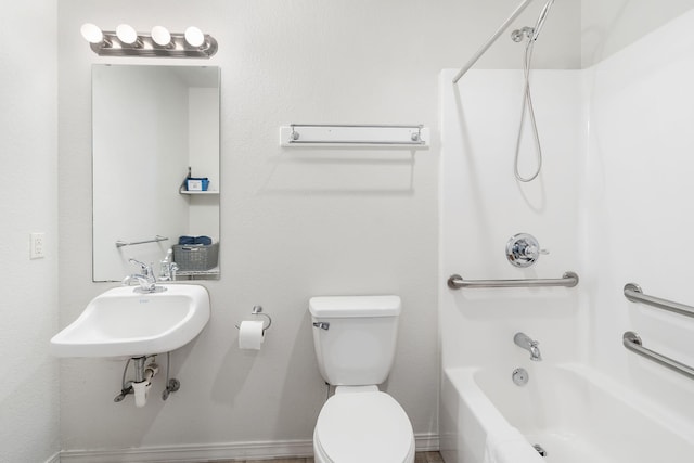 full bathroom featuring bathtub / shower combination, toilet, and sink