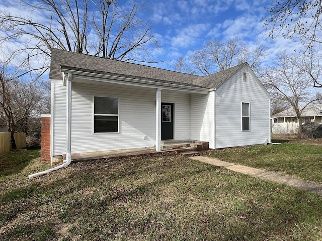 view of front of property with a front lawn