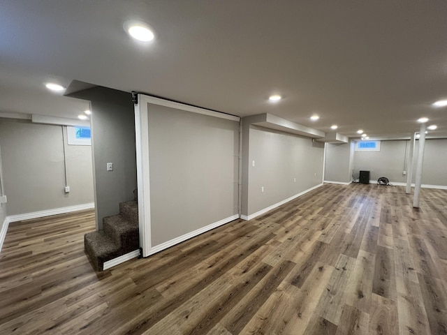 basement featuring dark wood-type flooring