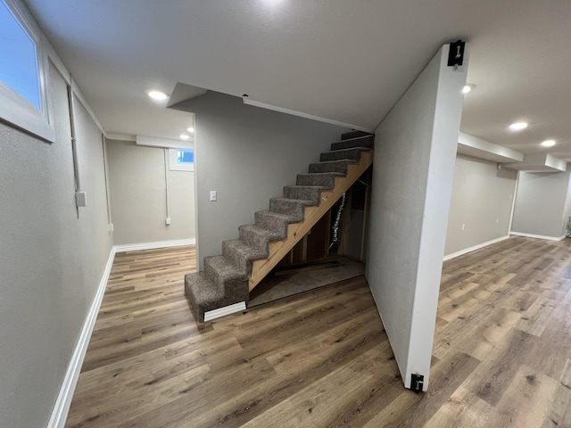 basement with wood-type flooring