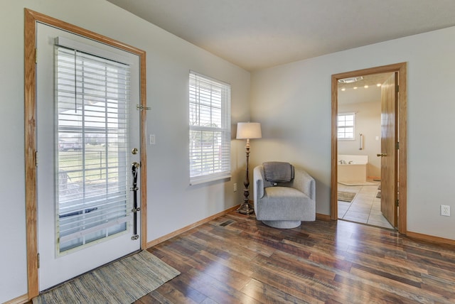 living area featuring dark hardwood / wood-style flooring