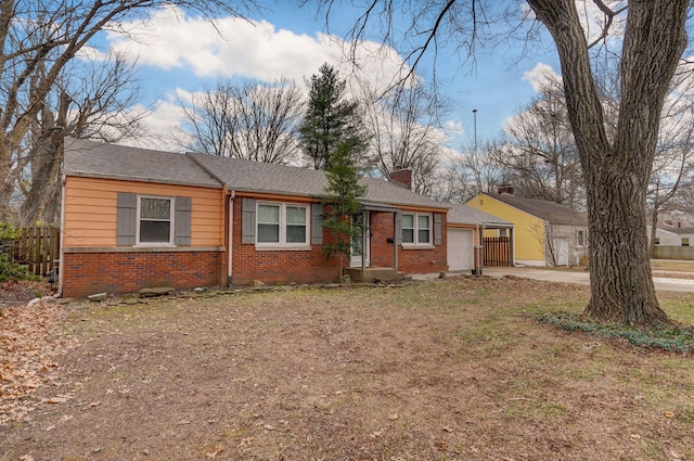 single story home with a garage