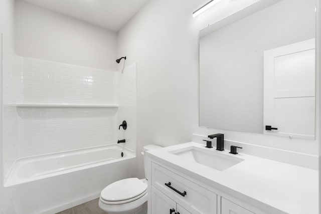 full bathroom with vanity, shower / bath combination, and toilet