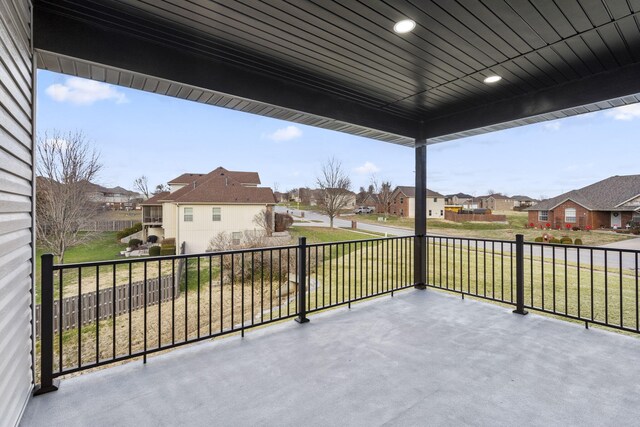 view of patio featuring a balcony