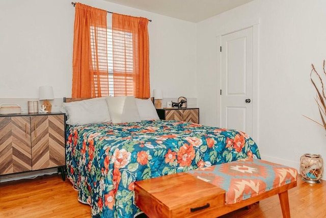 bedroom with wood-type flooring