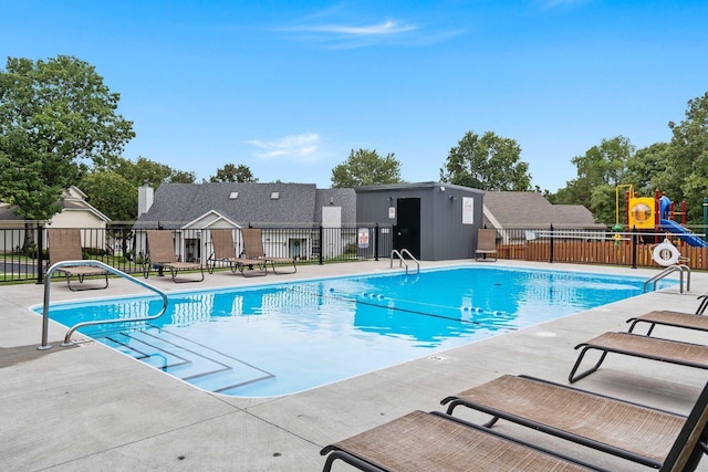 view of swimming pool featuring a patio area