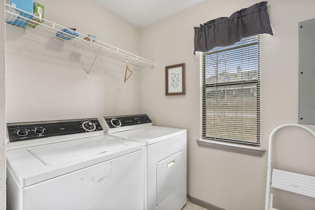 clothes washing area with washer and dryer