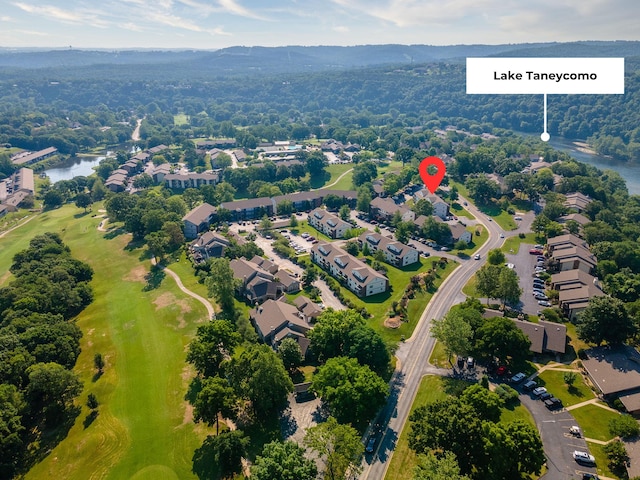 123 Bunker Ridge Dr Unit 8, Branson, MO 65616 - aerial view of property and surrounding area featuring nearby suburban area and a large body of water