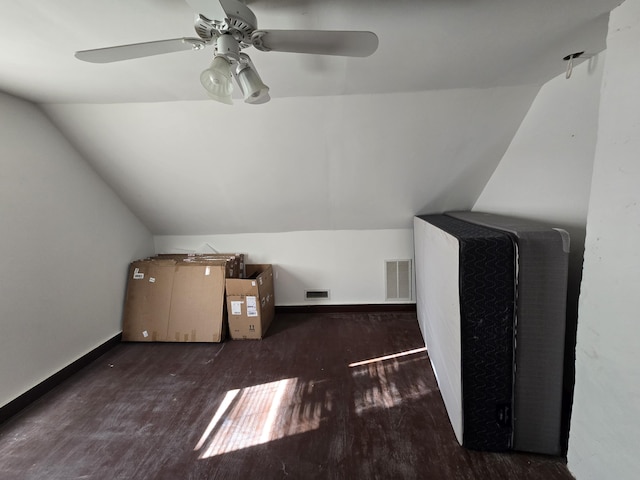 bonus room with dark hardwood / wood-style flooring, ceiling fan, and lofted ceiling