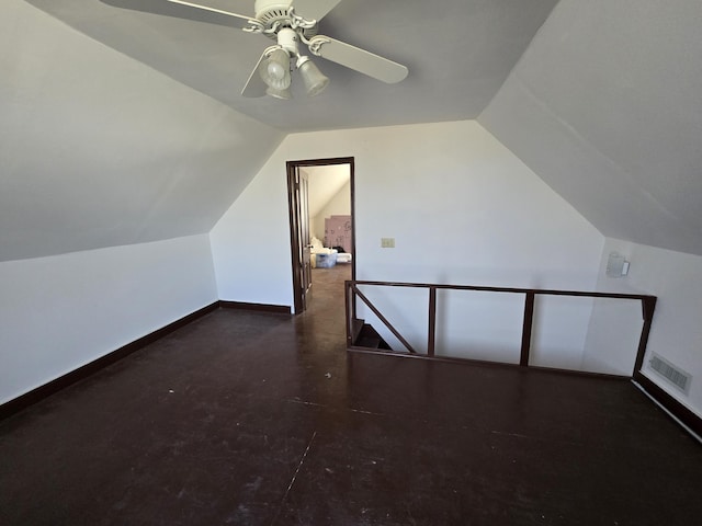 additional living space with ceiling fan and lofted ceiling