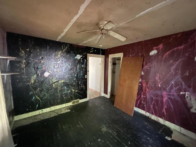 miscellaneous room with hardwood / wood-style floors and ceiling fan