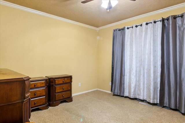 bedroom with light carpet, a textured ceiling, ceiling fan, and ornamental molding