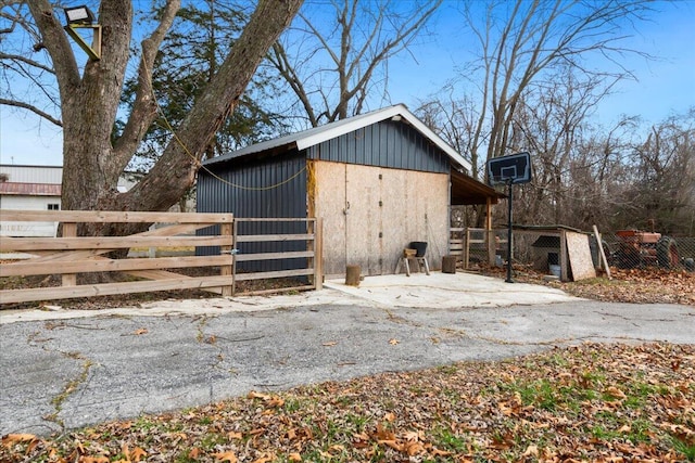 view of home's exterior featuring an outdoor structure