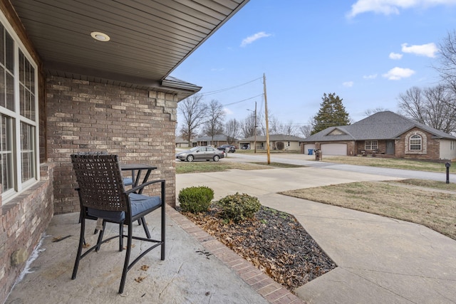 view of patio featuring a garage