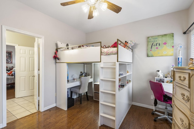 bedroom with hardwood / wood-style flooring and ceiling fan