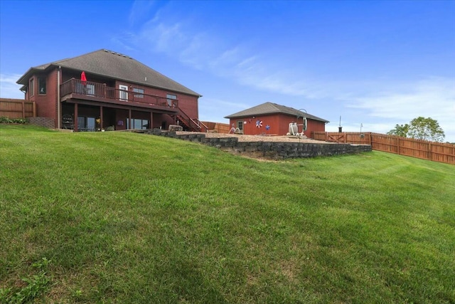 view of yard with a deck