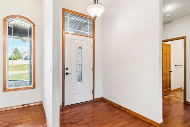 foyer featuring dark hardwood / wood-style floors