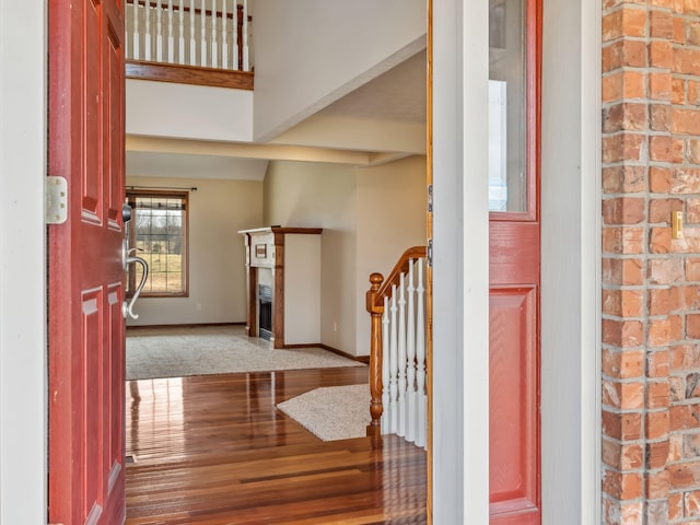 view of carpeted foyer