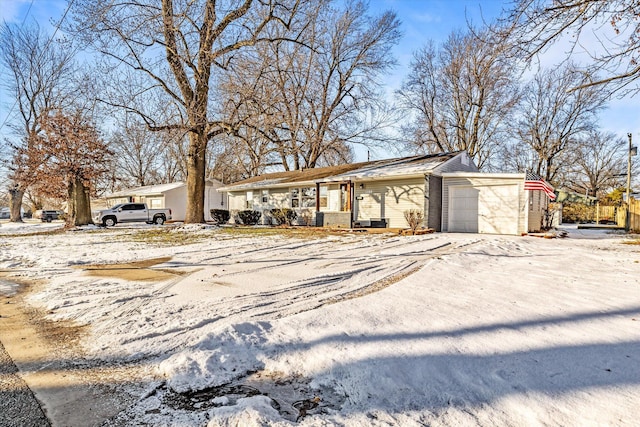 single story home with a garage