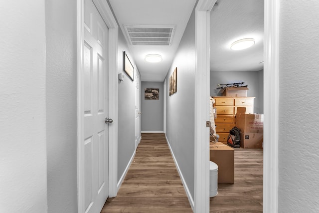 hall featuring hardwood / wood-style flooring