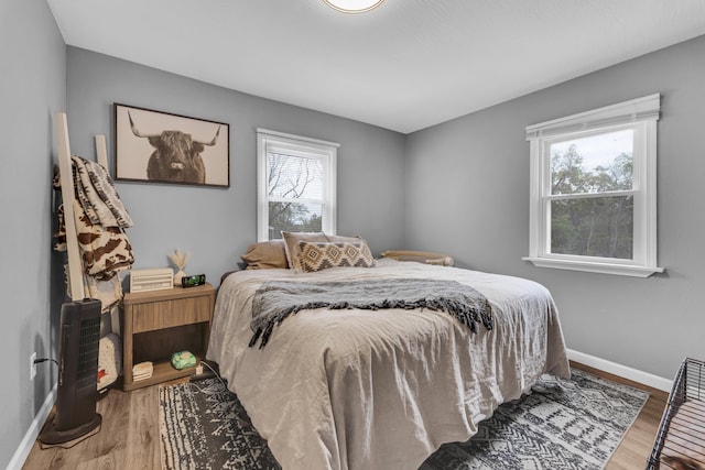 bedroom featuring hardwood / wood-style flooring