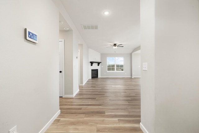 hallway featuring light wood-type flooring