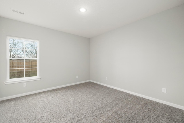 unfurnished room featuring carpet flooring