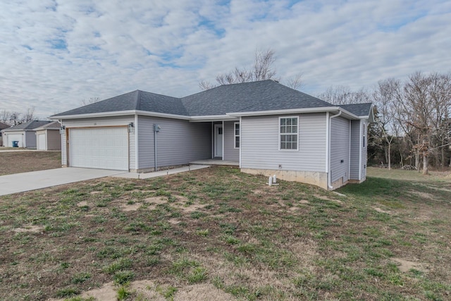 single story home with a front yard and a garage