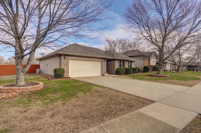 ranch-style house with a front lawn and a garage