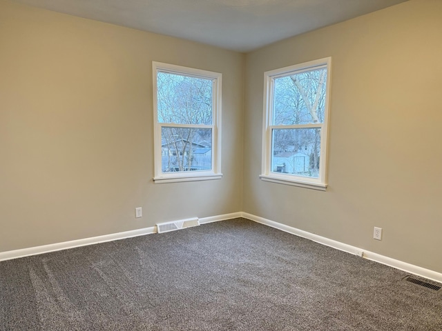 view of carpeted spare room