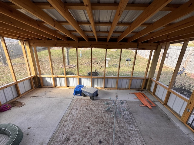 unfurnished sunroom with a wealth of natural light