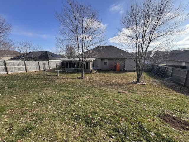 view of yard featuring a sunroom