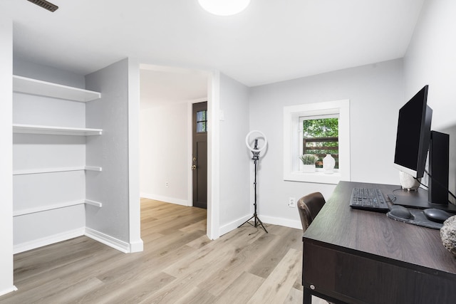 office space featuring light hardwood / wood-style floors