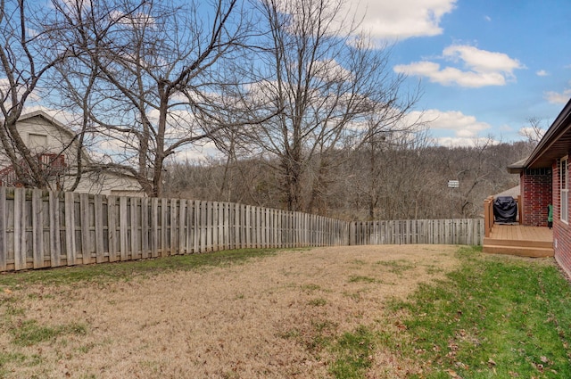 view of yard featuring a deck